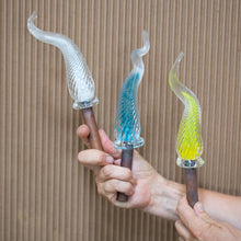 Three examples of the Percolla Reed garden sculptures made at the Glass Academy