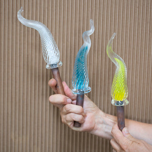 Three examples of the Percolla Reed garden sculptures made at the Glass Academy