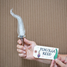 Sample of a white Percolla Reed garden sculpture from the hands on glass blowing glass